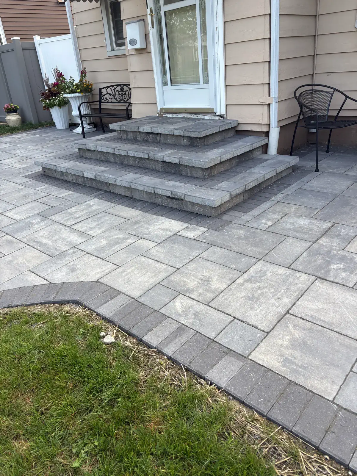 Paver patio with newly built stairs